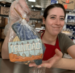 Baker handing out a Trinidad Colorado cookie